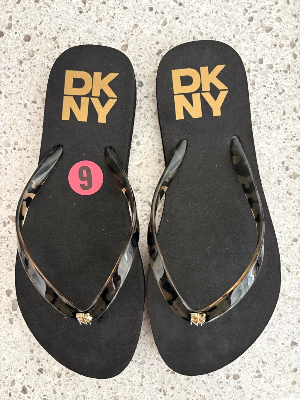DKNY Black Flip Flop Sandals with Gold Logo
